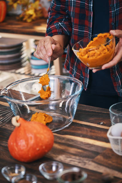 istock Preparing Pumpkin Pie for the Holidays in Domestic Kitchen 1267369728
