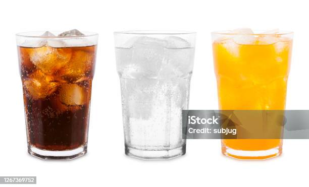 Soda Drinks Orange Lemon Lime And Cola Stock Photo - Download Image Now - Drinking Glass, Soda, Drink