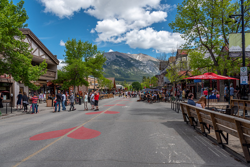 Canmore, Alberta - June 21, 2020: View along main street in Canmore Alberta. The street has been closed to traffic following the reopening after the covid-19 shut down.