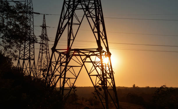 istock transmission lines tower in sunset 1267373218