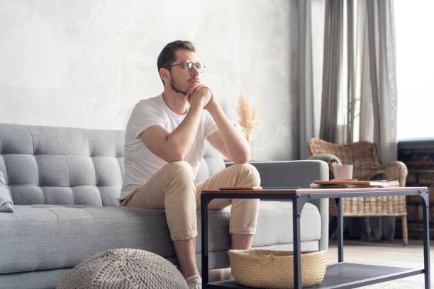 istock Thoughtful pensive handsome male student thinking about new idea or project analysing planning making decision concept 1267373260