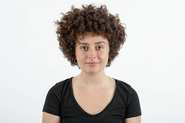 istock Young woman looking at camera 1267375221