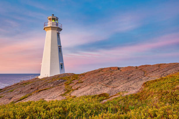 Cape Spear Lighthouse near St John's Newfoundland Canada at sunset Stock photograph of the landmark Cape Spear Lighthouse near St John's, Newfoundland, Canada at sunset. Cape Spear is the most easterly point in Canada. st. johns newfoundland photos stock pictures, royalty-free photos & images
