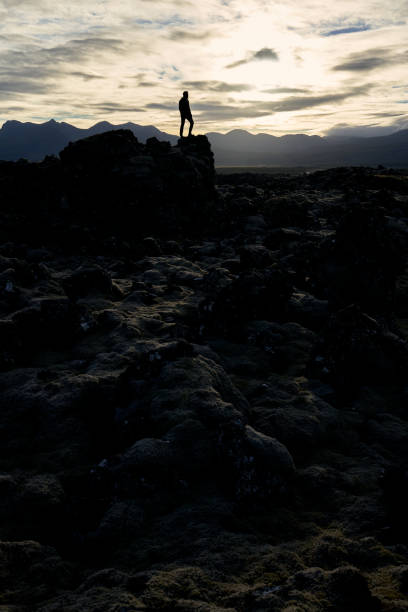 istock Man looking into a martian passage in a remote part of iceland 1267383494