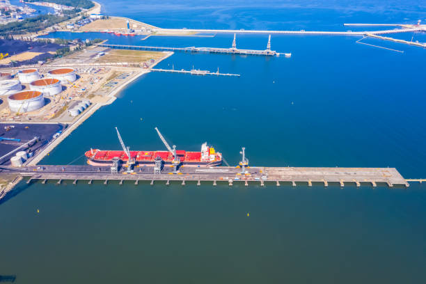 istock Aerial top view container cargo ship, in import export business logistic and transportation by container ship international open sea. 1267388172