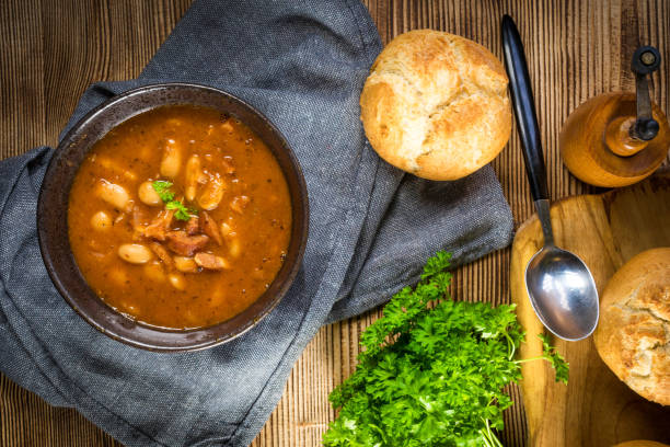 istock Beans with tomato sauce, bacon and sausage. 1267389774