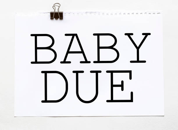 istock white paper with text Baby Due on a white background with stationery 1267390526