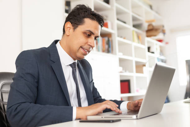 istock Freelance worker browsing the internet in the office. 1267392683