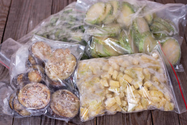 istock Frozen vegetables in plastic bags on a table. 1267393495