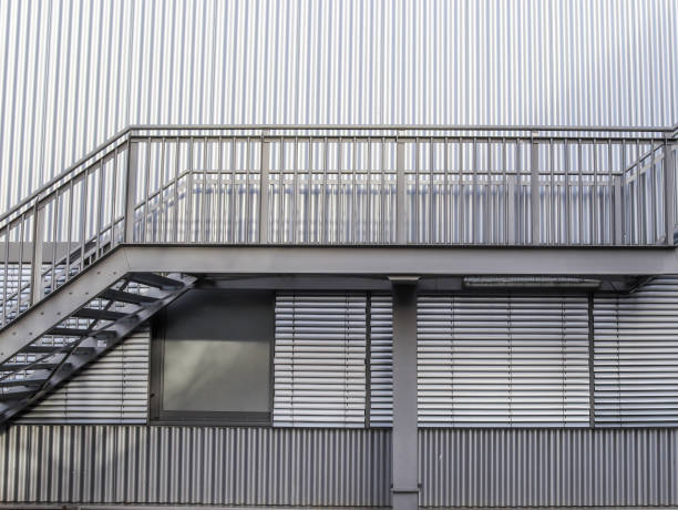 istock Close up view on metallic stairs at a modern architecture building. 1267400528