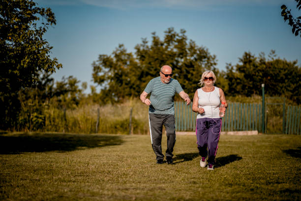 istock Senior couple running outside 1267403842