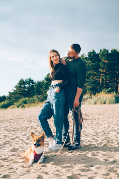 istock A man and a woman standing on a beach 1267417223