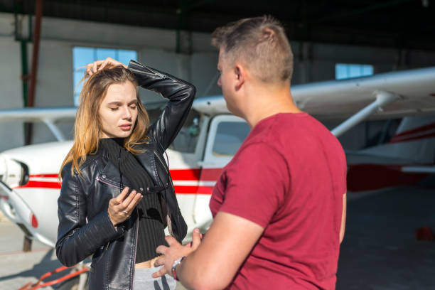 istock A business lady and a pilot discuss the upcoming flight 1267417309