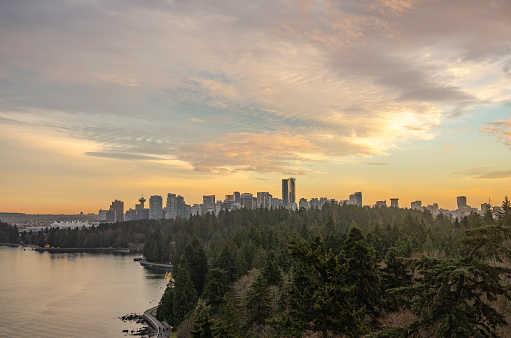 Pastel sky and view of Stanley Park and downtown Vancouver from the Lions Gate bridge