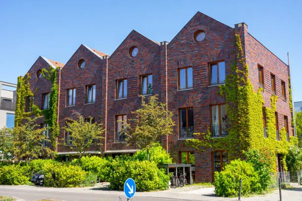 Serial houses made of red bricks seen in Berlin, Germany