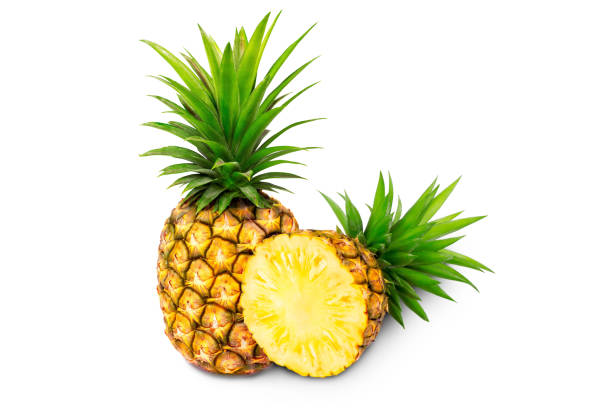 istock whole pineapple and pineapple slice. Pineapple with leaves isolate on white. 1267442192