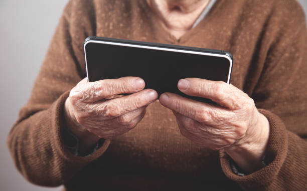 istock Caucasian elderly woman using smartphone. 1267443080
