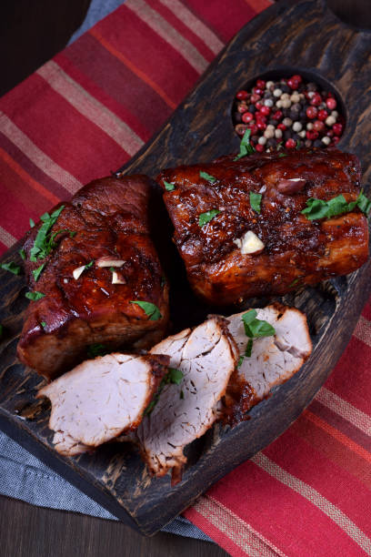 istock Wine glazed pork tenderloin cut into slices 1267453080