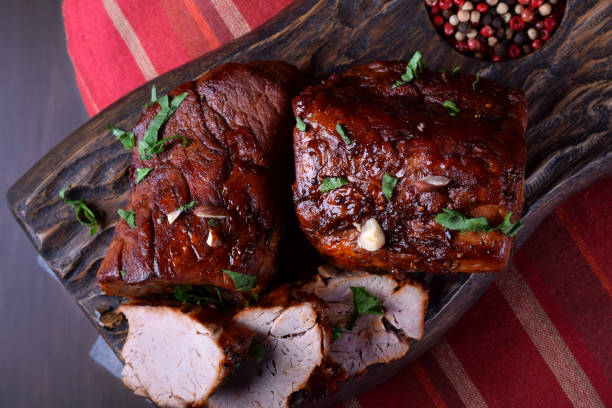 istock Wine glazed pork tenderloin cut into slices 1267453099