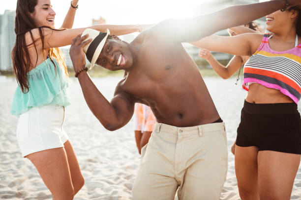 istock friends doing a party at the beach 1267457779