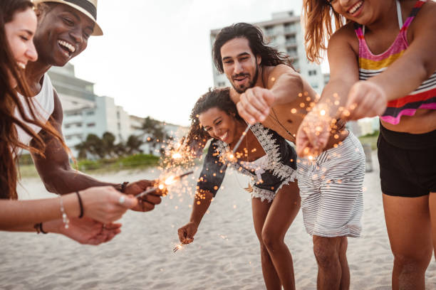 istock friends doing a party at the beach 1267457815