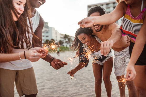 istock friends doing a party at the beach 1267457905