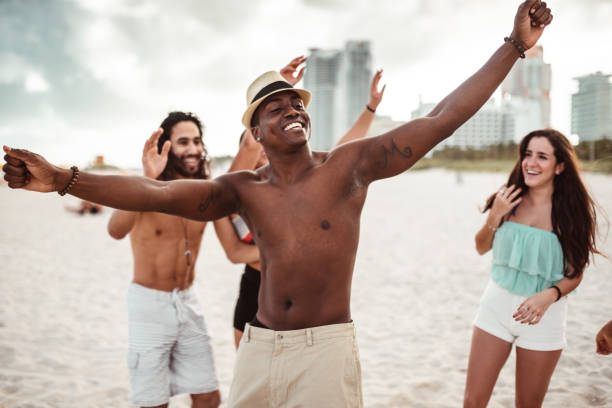istock friends doing a party at the beach 1267457955