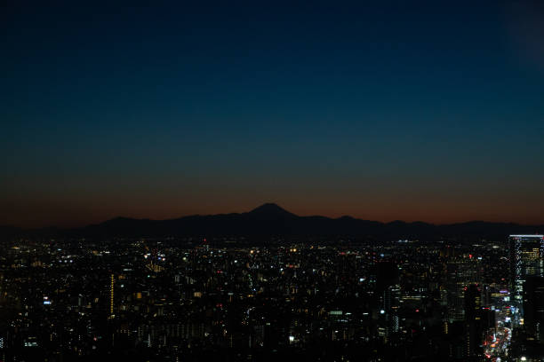 istock Mt Fuji with city night view 1267459322