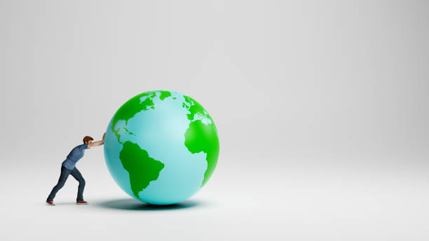 istock Young Man Pushing the Earth Planet 1267460497