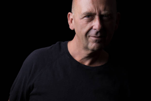 istock self portrait of a man with black background 1267463163