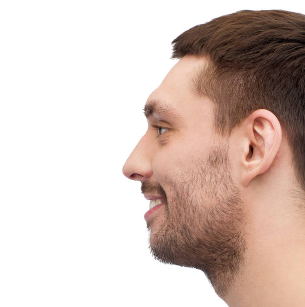 istock profile portrait of smiling young handsome man 1267467921