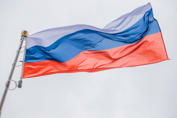 istock Russian flag waving on a flagpole 1267469465