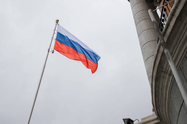 istock Russian flag waving on a flagpole 1267470057