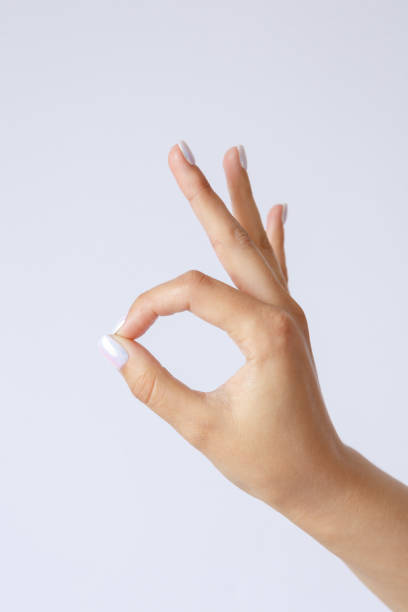 istock Gesture and sign, hand on a white background. Hand showing ok 1267471629