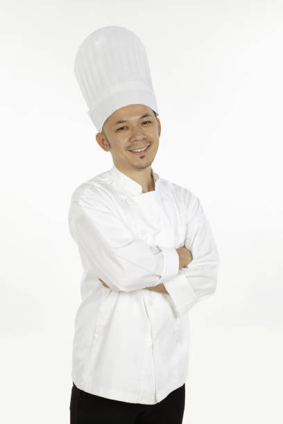 istock Asian chef posing with arms crossed 1267472216