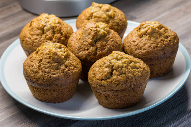 istock Muffins in plate on kithen counter top 1267473601