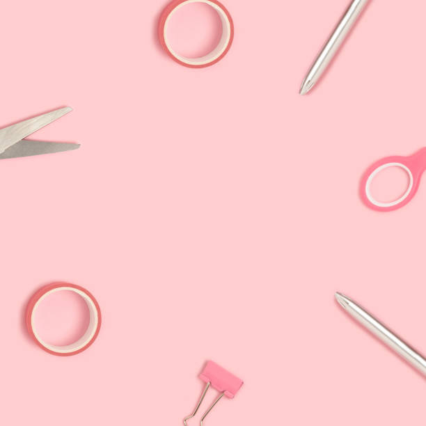 istock School supplies frame on a pink background. 1267473983