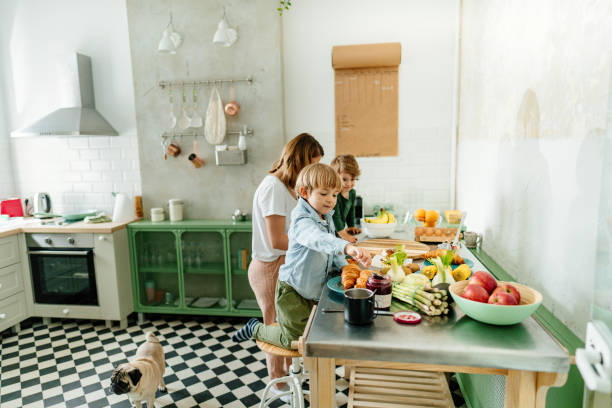 istock Preparing healthy breakfast with my boys 1267475766