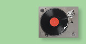 Turntable is playing vinyl LP record top view. Clipping path