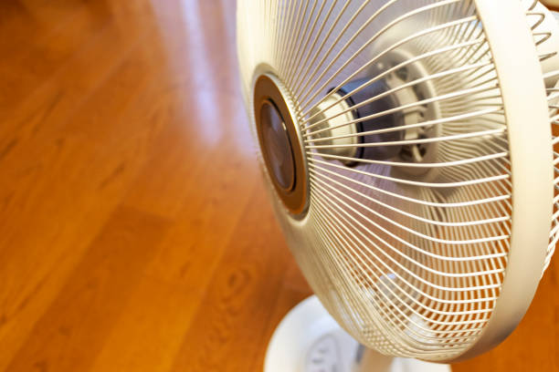 istock Wooden floor and white fan 1267475800