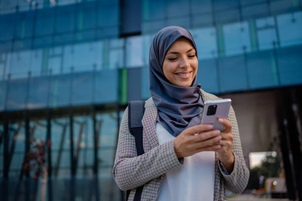 istock Muslim businesswoman typing message 1267476254