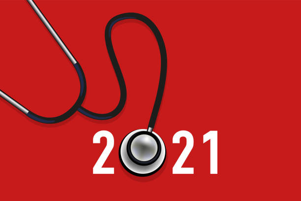 istock 2021 health greeting card symbolized by a stetoscope on a red background. 1267477677