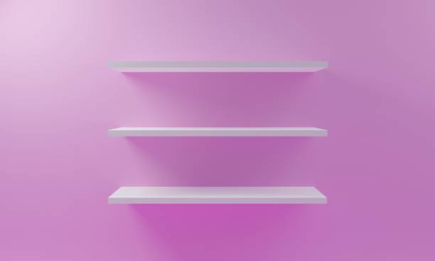 istock Empty white display shelves on the wall, bookshelf or retail shelf concept, 3D render 1267477897