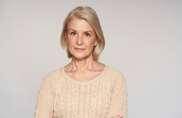 istock Beautiful mature woman smiling isolated 1267478160
