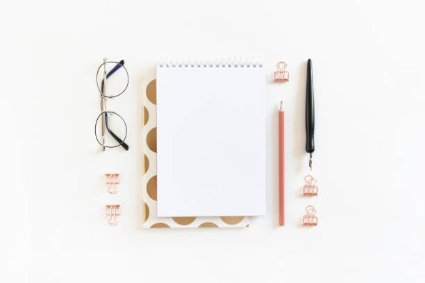 istock Spiral notepad mockup with glasses and stationery 1267479419