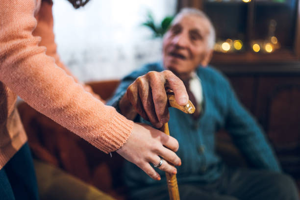 istock Granddaughter helping her grandpa 1267480980
