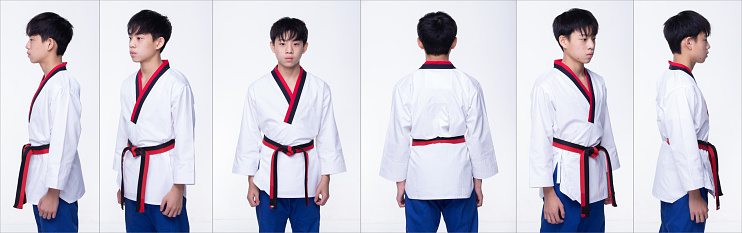 Master Black Belt TaeKwonDo Karate national athlete young teenager show traditional Fighting poses Poomse in sport dress, studio lighting white background isolated, 360 rear back side view