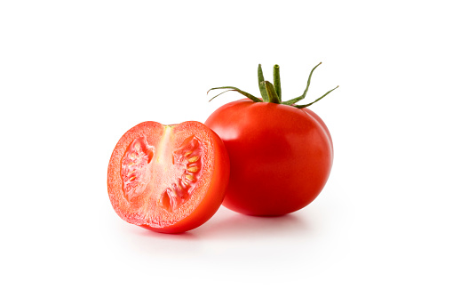 Ripe fresh red tomato with water drop and without isolated on white background with clipping path. Full Depth of Field