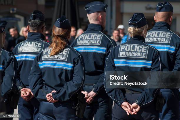 Policemen Standing On The Main Place During The Thirtieth Anniversary Ceremony Of The Creation Of The Municipal Police Stock Photo - Download Image Now