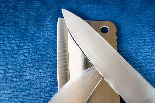 istock Kitchen knives collections on the blue background, tools and instruments for cooking. 1267490058